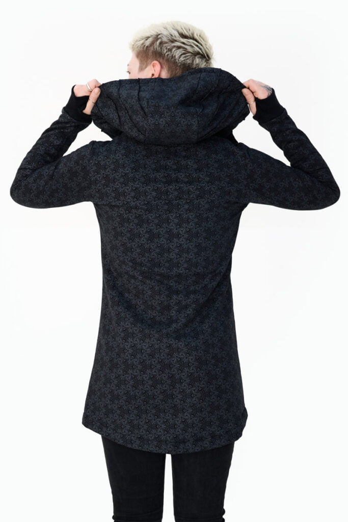 Avanyah's black Impulse hooded jacket with eye-catching art print is perfect for men and women looking for unique festival fashion and wearable art.